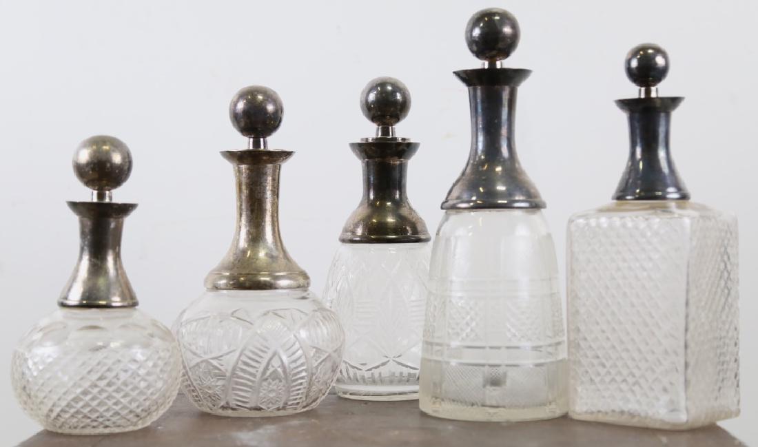 SET OF FIVE CUT GLASS WITH SILVER TOP DECANTERS (1 of 1)