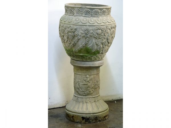 Terracotta pot on stand.