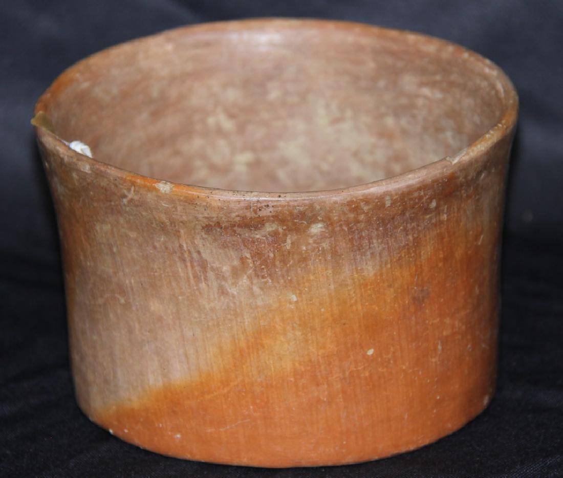 PRE-COLUMBIAN TERRACOTTA BOWL: PRE-COLUMBIAN TERRACOTTA BOWL. HAS SEVERAL NICKS ON RIM AREA. Height: 3.5 in. by Width: 5 in.