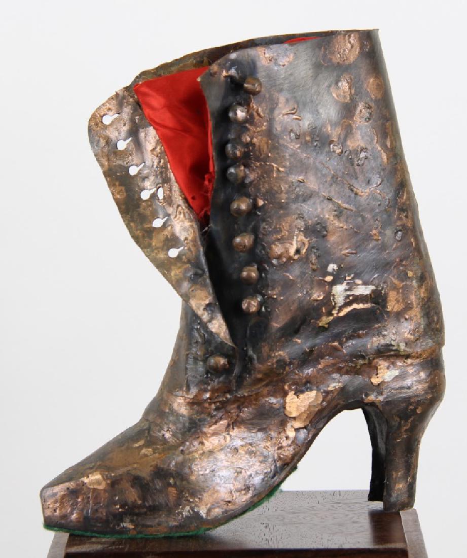 ROBERT LEROY SHUEY "BOOT" COPPER SCULPTURE: ROBERT LEROY SHUEY "BOOT" COPPER SCULPTURE. Height: 10 1/2 in. by Width: 10 in. by Depth: 4 1/2 in.