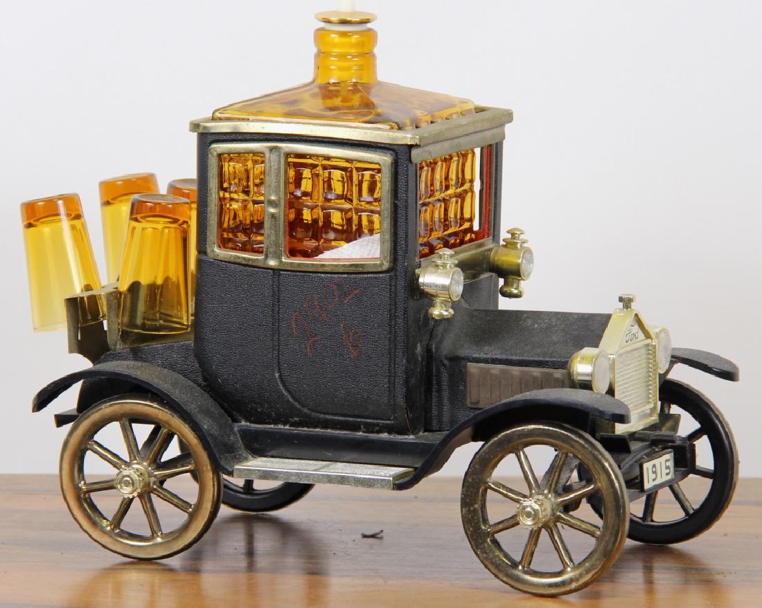CAR LIQUOR DECANTER & SHOT GLASS SET: CAR LIQUOR DECANTER & SHOT GLASS SET. Height: 12 in. by Width: 7 in. by Depth: 7 in.
