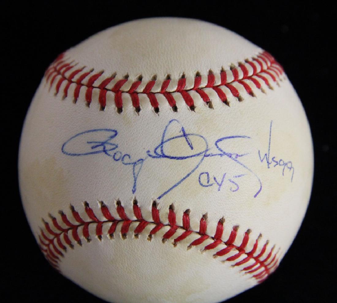 SIGNED ROGER CLEMENS BASEBALL: SIGNED ROGER CLEMENS BASEBALL. Height: 3 1/2 in. by Width: 3 1/2 in. by Depth: 3 1/2 in.