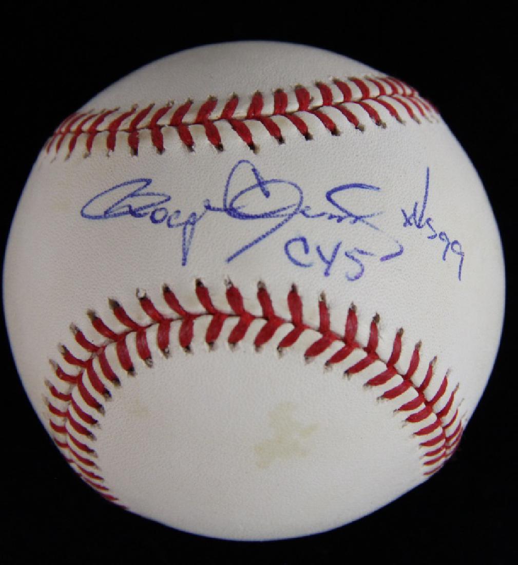SIGNED ROGER CLEMENS BASEBALL: SIGNED ROGER CLEMENS BASEBALL Height: 3 1/2 in. by Width: 3 1/2 in. by Depth: 3 1/2 in.