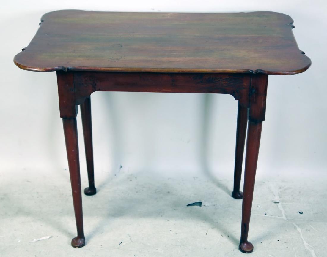 ELDRED WHEELER REPRODUCTION TEA TABLE: ELDRED WHEELER REPRODUCTION TEA TABLE ON SPADE FEET. Height: 27 in. by Width: 33 in. by Depth: 23