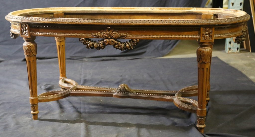 1930's OVAL FRENCH OTTOMAN: 1930's OVAL FRENCH OTTOMAN. Sold in as is condition, no upholstery, just frame. Height: 21 in. by Width: 47 in. by Depth: 21