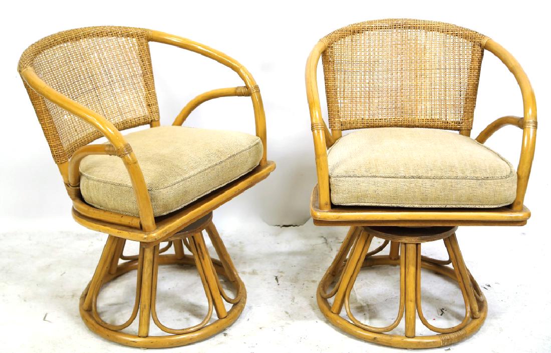 PAIR OF 1970's FICKS REED PATIO SWIVEL ARMCHAIRS: PAIR OF 1970's FICKS REED PATIO SWIVEL ARMCHAIRS. Height: 32 in. by Width: 23 in. by Depth: 24 in.