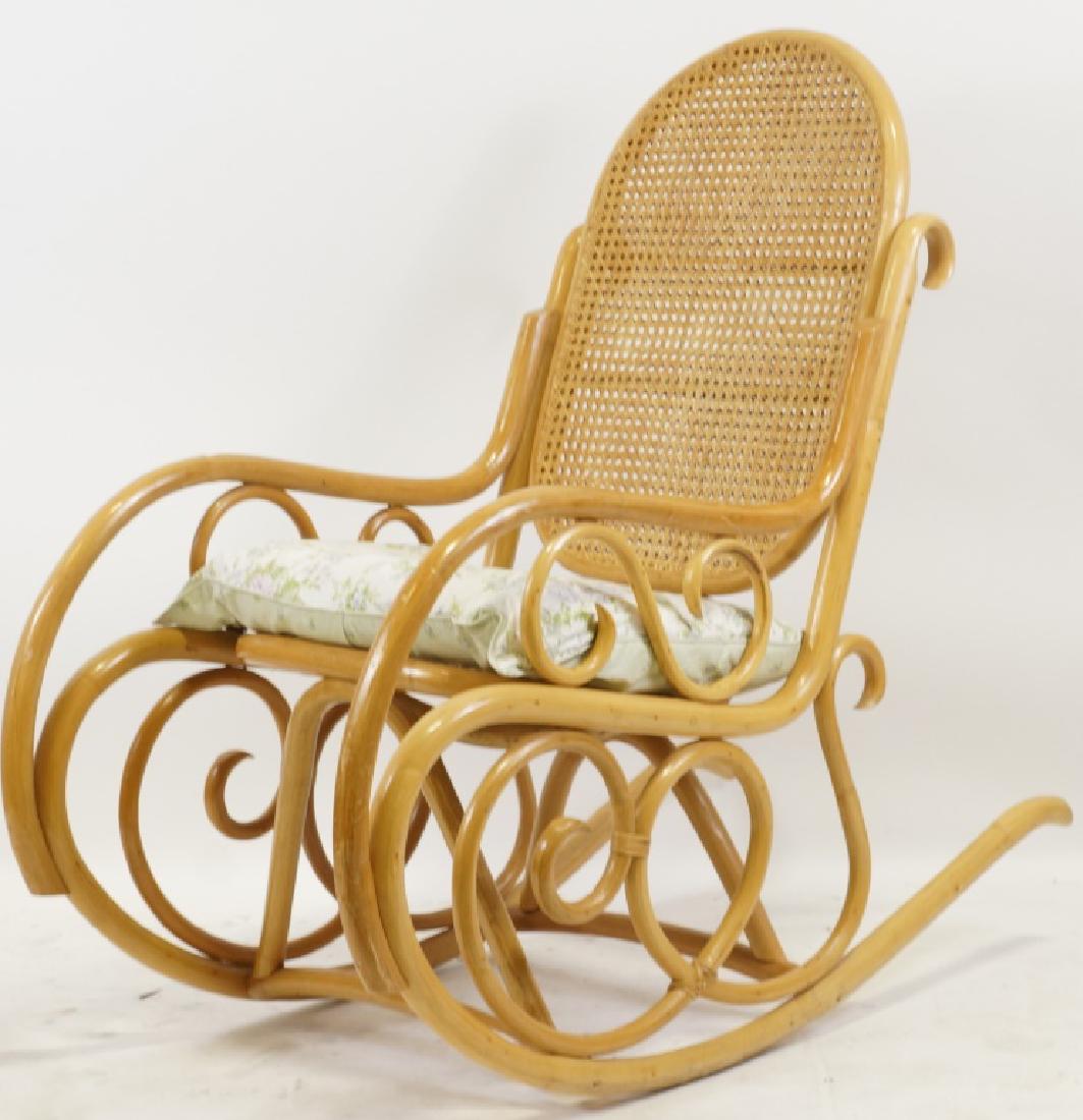 WICKER BACK ROCKING CHAIR: WICKER BACK ROCKING CHAIR Height: 43 in. by Width: 22 1/2 in. by Depth: 47 1/2 in.
