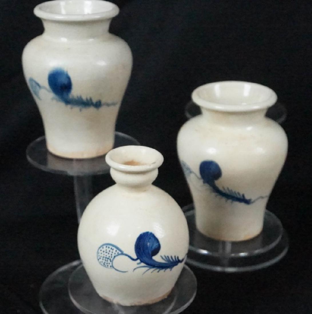 LOT OF THREE CHINESE EARTHENWARE VASES: LOT OF THREE CHINESE BLUE & WHITE EARTHENWARE VASES. Height: 6 in. by Width: 5 in. by Depth: 5 in.