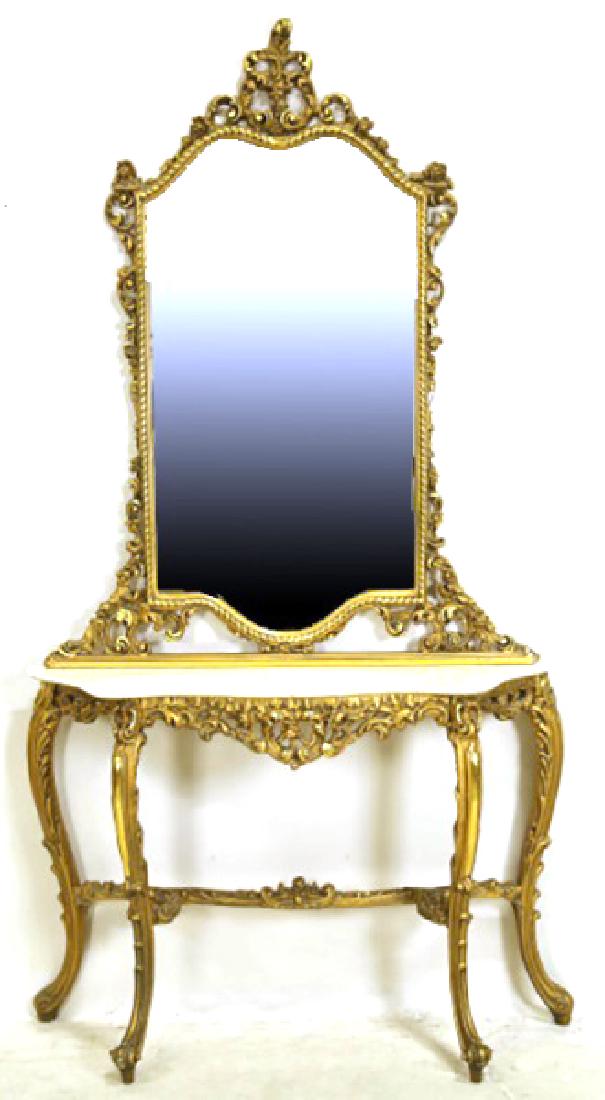 ANTIQUE ITALIAN GILT MARBLE TOP CONSOLE & MIRROR: ANTIQUE ITALIAN GILT CARVED MARBLE TOP CONSOLE & MIRROR. Height: 87 in. by Width: 46 in. by Depth: 12 in.