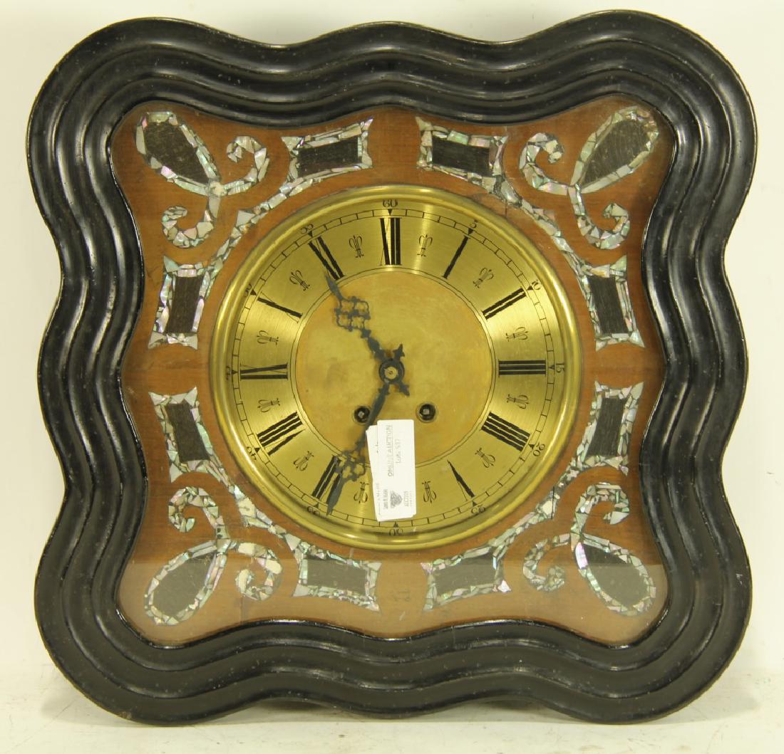 VINTAGE WALL CLOCK WITH ROMAN NUMERALS: VINTAGE WALL CLOCK WITH ROMAN NUMERALS. Height: 19 in. by Width: 19 in. by Depth: 5 1/2 in.