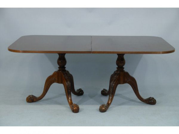 Double Postal Ball and Claw Dining Room table: Double pedestal ball and claw dining room table. Size: 73" x 31" x 47" extends to 97" long with leaf.