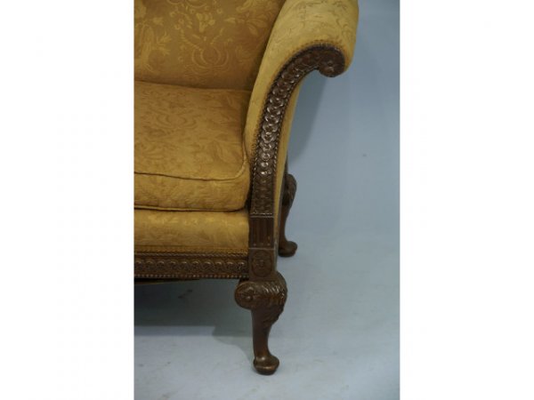 A 19th century English mahogany camelback sofa. - 2