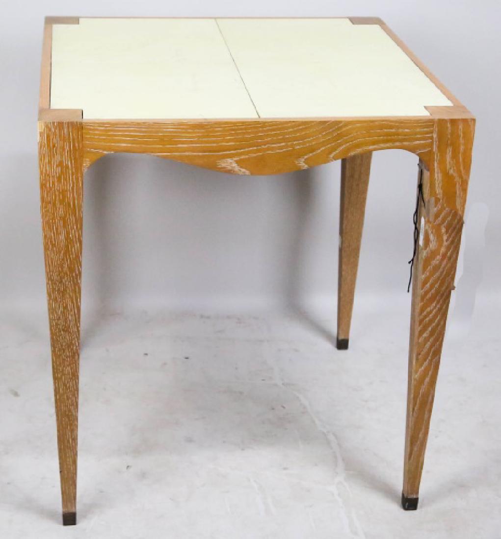 "COCTEAU" LEATHER TOP WITH BLOND WOOD TABLE: "COCTEAU" LAMBSKIN LEATHER TOP WITH BLOND WOOD FRAME TABLE. Height: 26 in. by Width: 23 1/2 in. by Depth: 23 1/2 in.