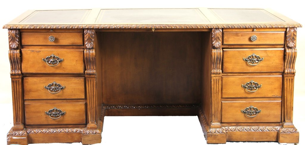 HEKMANN EXECUTIVE DESK WITH TOOLED LEATHER TOP: HEKMANN EXECUTIVE DESK WITH TOOLED LEATHER TOP AND EIGHT DRAWERS. Height: 31 in. by Width: 72 in. by Depth: 36