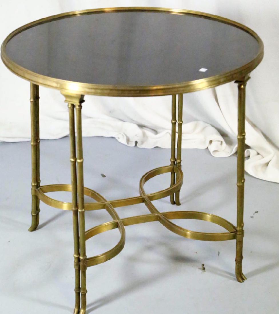 NEOCLASSICAL STYLE BLACK GRANITE TOP BRASS TABLE: NEOCLASSICAL STYLE BLACK GRANITE TOP BRASS SIDE TABLE. Height: 28 in. by Width: 29 in