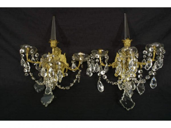 Pair of Empire style, ornate sconces.