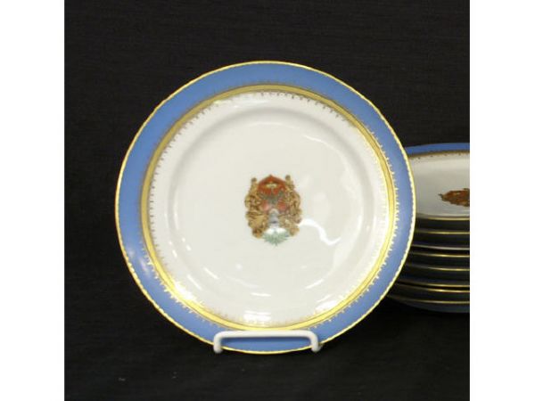 9 dinner plates with blue design