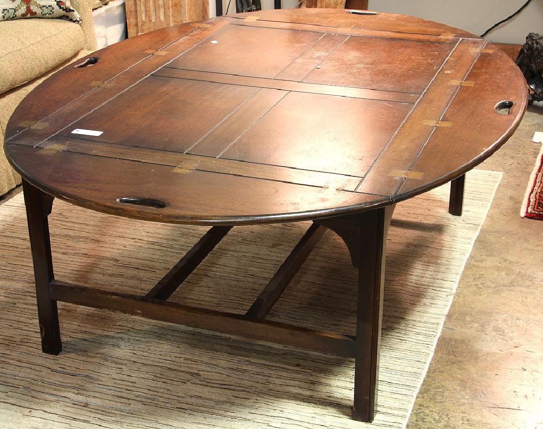 BUTLER'S DROP LEAF COFFEE TABLE: BUTLER'S DROP LEAF COFFEE TABLE. Height: 22 in. by Width: 48 in. by Depth: 65 1/2 in.