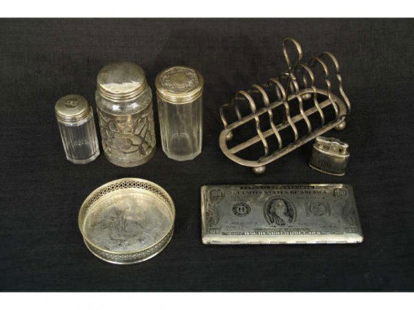 Mixed lot including three jars with silver tops,: Mixed lot including three jars with silver tops, silver-plate cigarette holder and lighter with $100 dollar design.