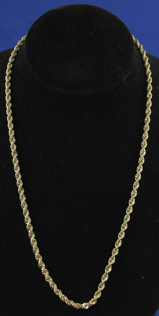 14 KT YELLOW GOLD ROPE TWIST NECKLACE: 14 KT YELLOW GOLD ROPE TWIST NECKLACE . 20 INCHES IN LENGTH & 23 GRAMS.
