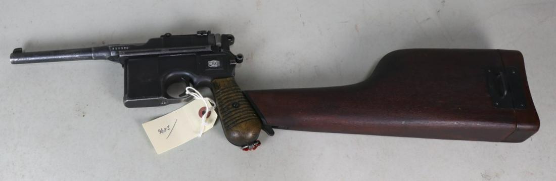 1930 MAUSER COMMERCIAL C96 BROOMHANDLE W/STOCK: 1930 MAUSER COMMERCIAL C96 BROOMHANDLE W/ HOLSTER STOCK; CALIBER: 7.63X25MM; SERIAL NUMBER: 809350; USED FIREARM; (L1395)