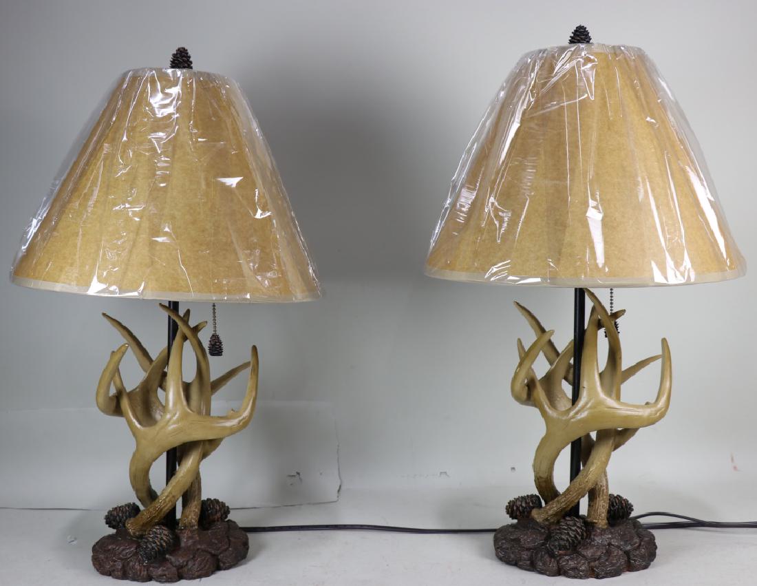 PAIR OF FAUX ANTLER LAMPS WITH PARCHMENT SHADES: PAIR OF FAUX ANTLER LAMPS WITH PARCHMENT SHADES. Height: 24 in. by Width: 8 in. by Depth: 8 in.