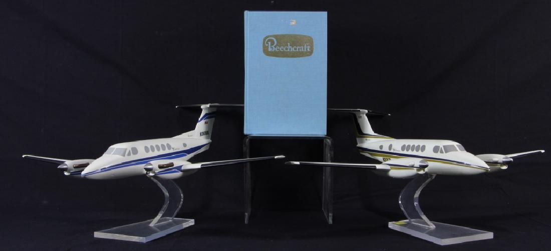 BEECHCRAFT BOOK & MODEL PLANES: BEECHCRAFT BOOK & MODEL PLANES. Height: 8 1/2 in. by Width: 20 1/2 in. by Depth: 16 in.