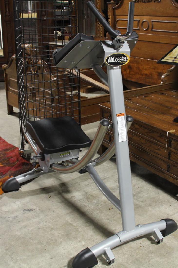 AB COASTER EXERCISE MACHINE: AB COASTER EXERCISE MACHINE. Height: 54 in. by Width: 55 in. by Depth: 3 in.