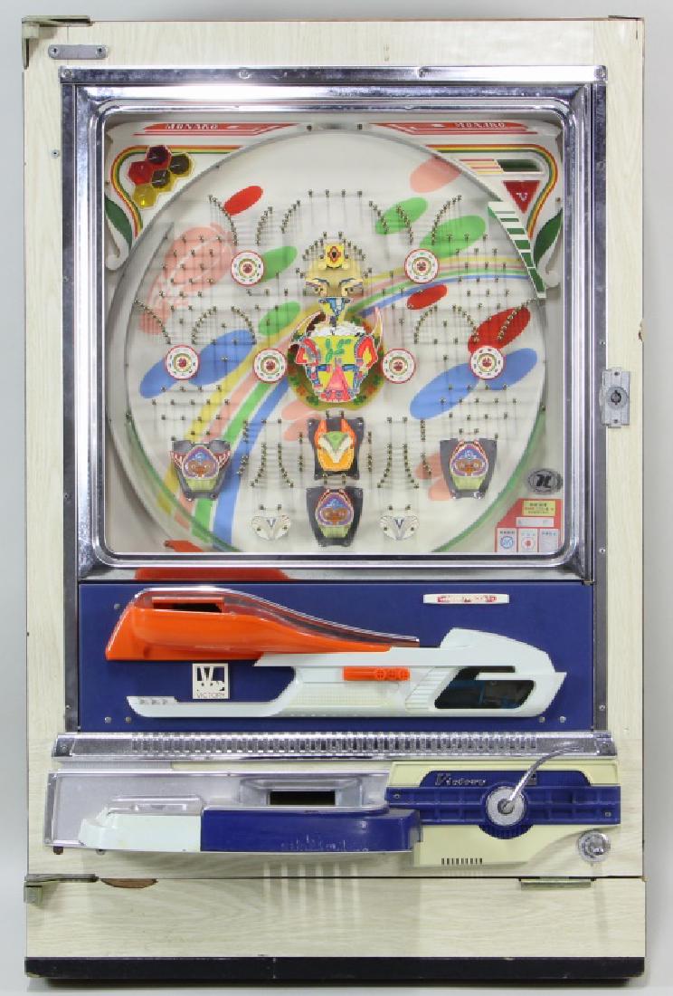 MONAKO PACHINKO MACHINE: MONAKO PACHINKO MACHINE. Height: 32 in. by Width: 21 in. by Depth: 6 1/2 in.