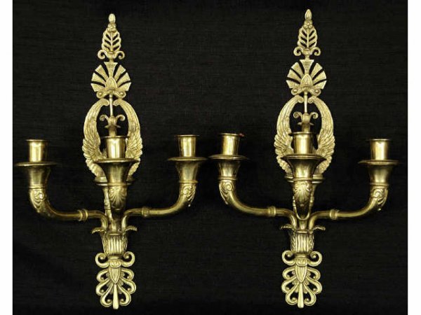 Pair of Empire style brass three-arm sconces.
