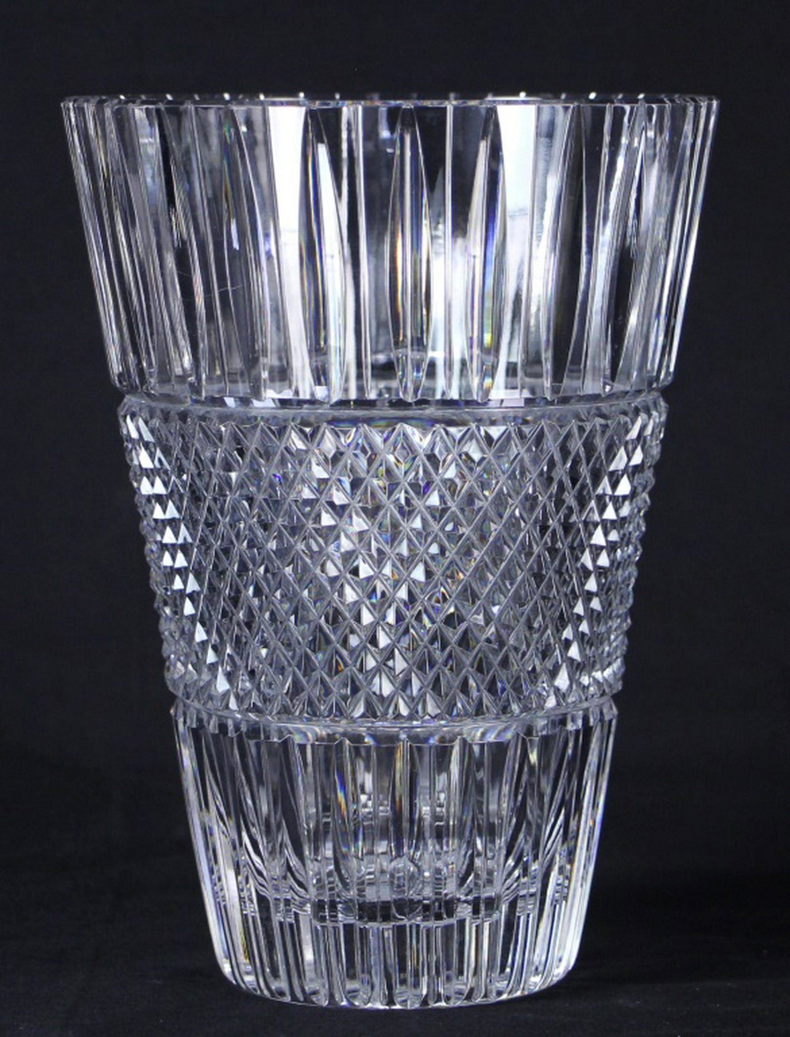 VINTAGE WATERFORD CUT GLASS VASE: VINTAGE WATERFORD CUT GLASS VASE. Height: 8 in. by Width: 6 in. by Depth: 6 in.