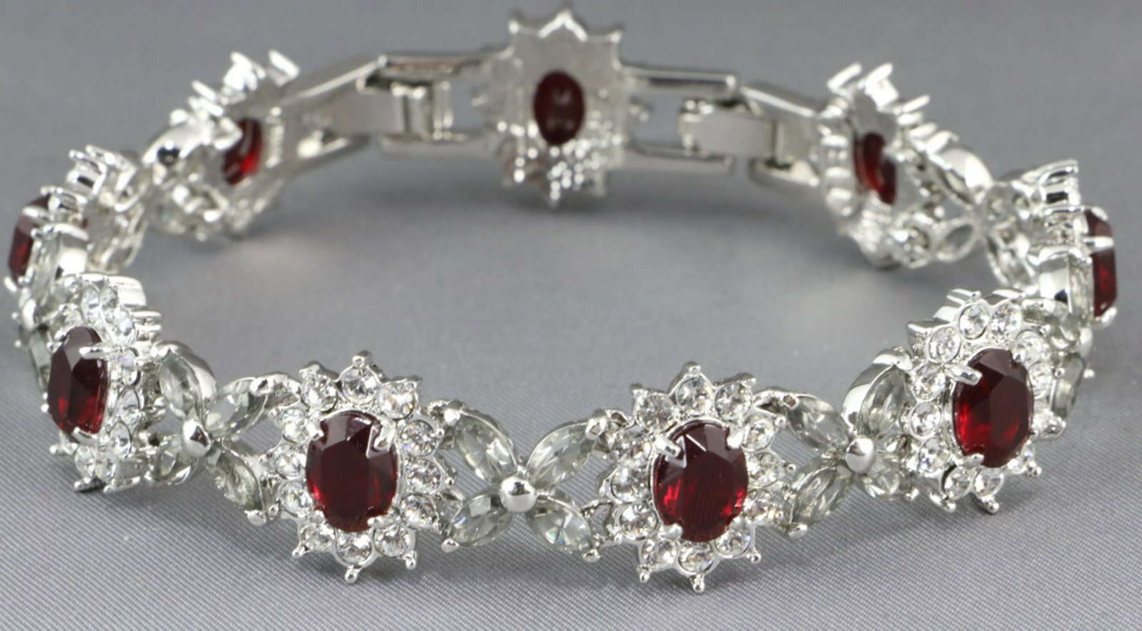 CAMROSE & KROSS JACKIE KENNEDY TENNIS BRACELET: CAMROSE & KROSS JACKIE KENNEDY GOLD WASH TENNIS BRACELET.