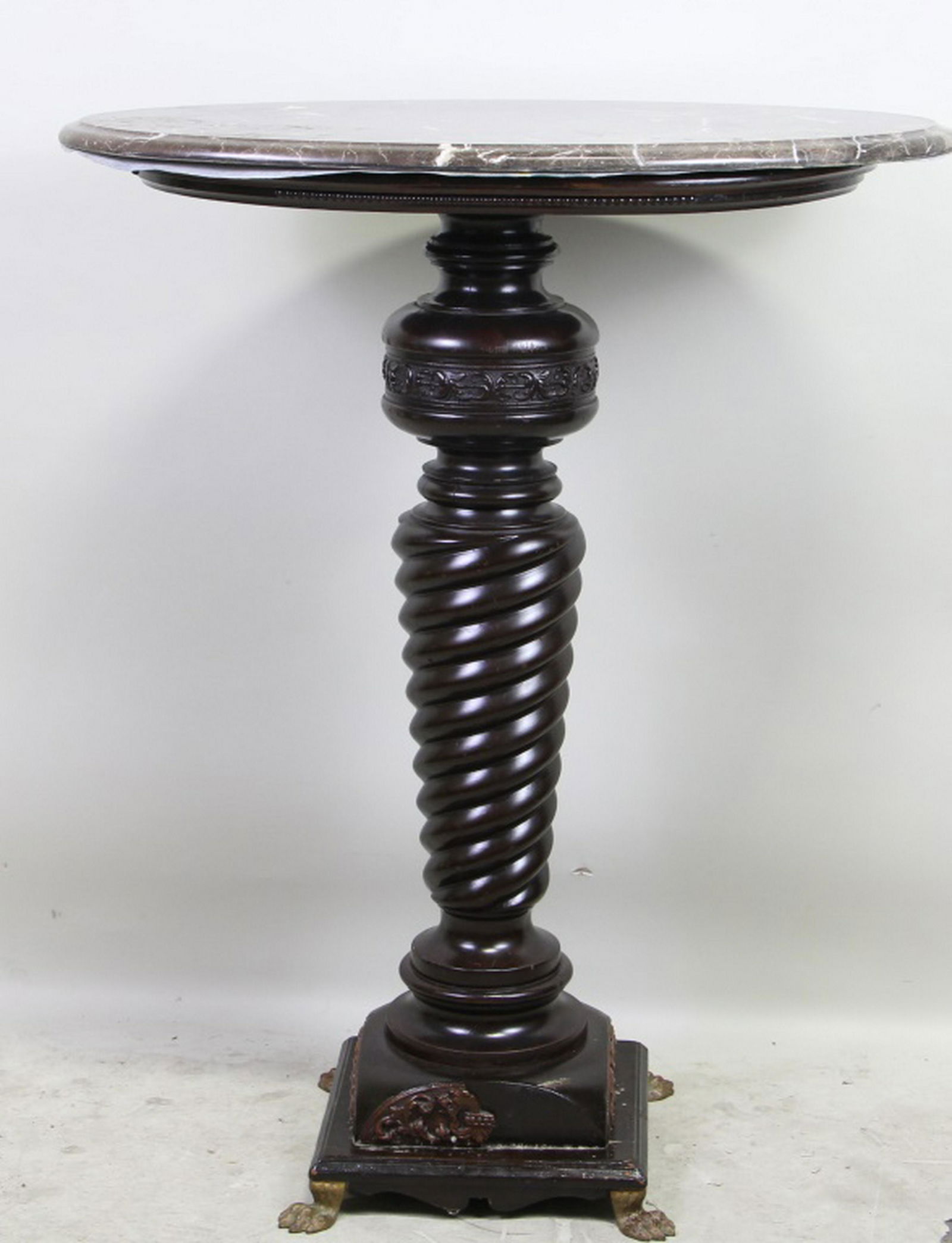 ANTIQUE MARBLE TOP PEDESTAL TABLE: ANTIQUE MARBLE TOP PEDESTAL TABLE. PART OF THE CARVING IS MISSING AT THE FOOT OF THE TABLE, SOLD AS IS. Height: 42 in. by Width: 34 in. by Depth: 22 in.