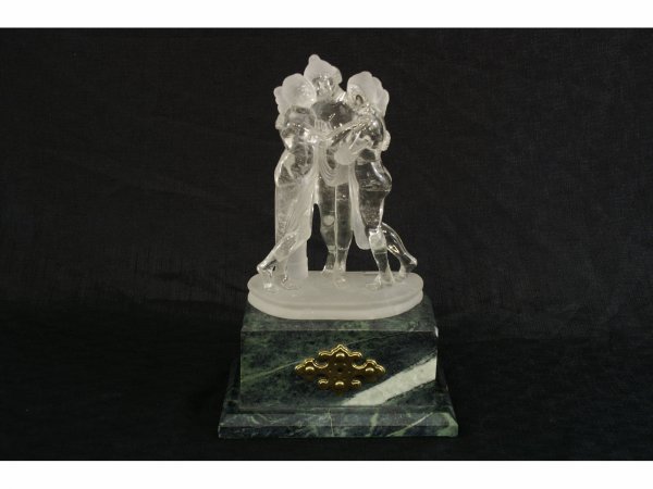 Small rock crystal statues of 3 women.