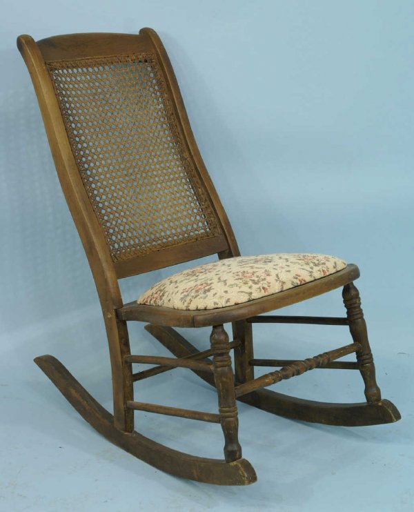 Cane-back rocker chair.