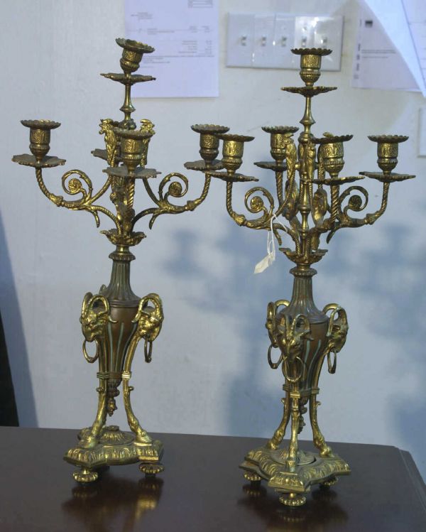PAIR OF CANDELOBRA WITH RAMS HEADS AND HOOVES.