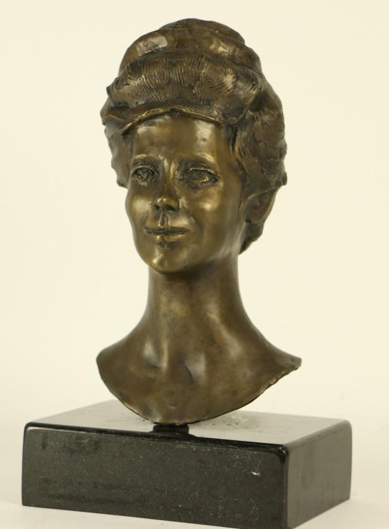 DAVID ADICKES BRONZE BUST OF IMA HOGG: DAVID ADICKES BRONZE BUST OF IMA HOGG ON MARBLE BASE. FROM THE FIRESTONE/RUNNELS ESTATE. Height: 12 in. by Width: 7 in. by Depth: 5 1/2 in.