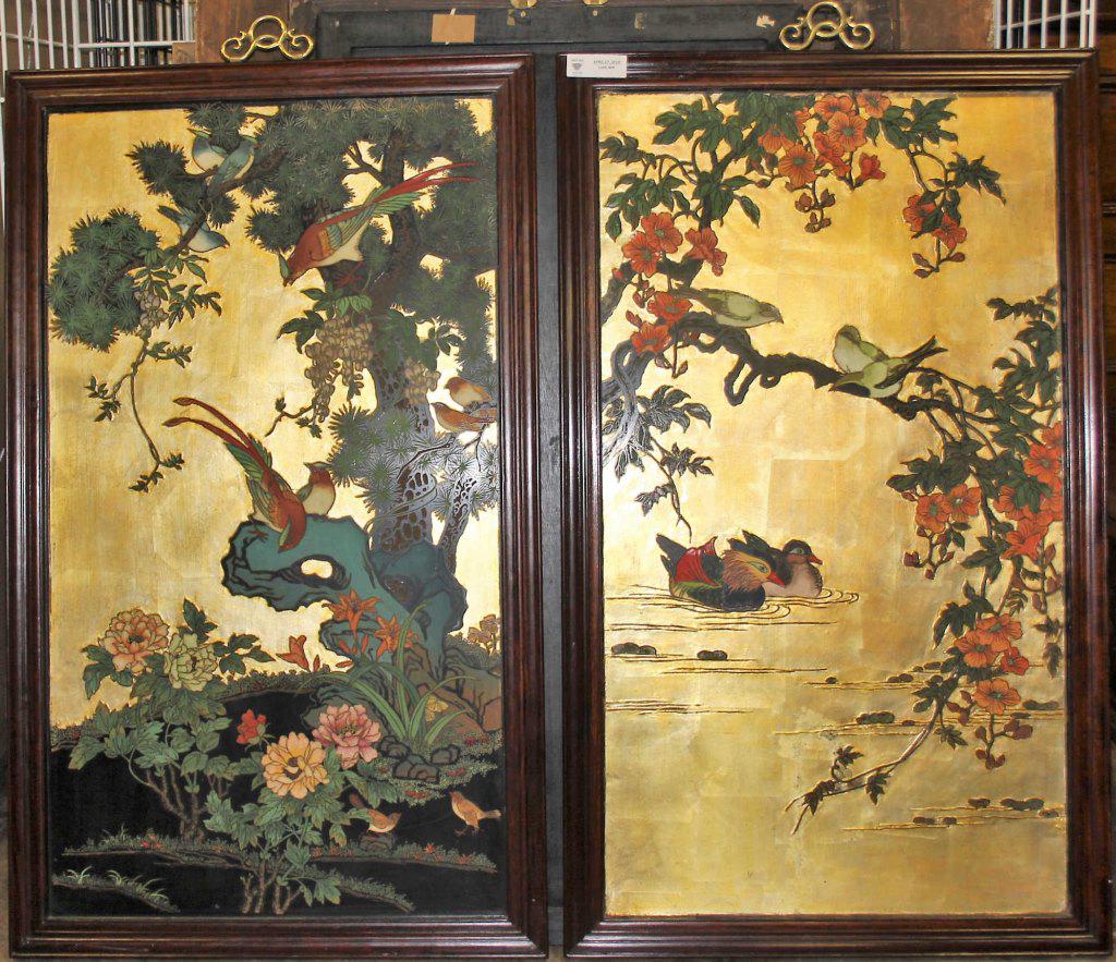 PAIR OF CHINESE BIRD WALL PLAQUES: PAIR OF CHINESE BIRD WALL PLAQUES OF GOLD LEAF ON TO WOODEN PANEL, WITH RAISED BIRDS AND FOLIAGE CARVING THEN LACQUERED. Height: 43 in. by Width: 24 in. by Depth: 1 1/2 in.