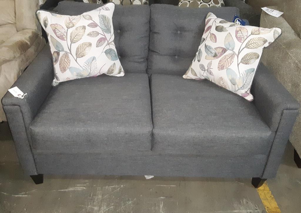 NEW SERTA CHARCOAL LOVESEAT W/2 LEAF PILLOWS: NEW SERTA CHARCOAL LOVESEAT W/2 PILLOWS (MATCHES LOT#141 SOFA) Height: 30 in. by Width: 78 in. by Depth: 24