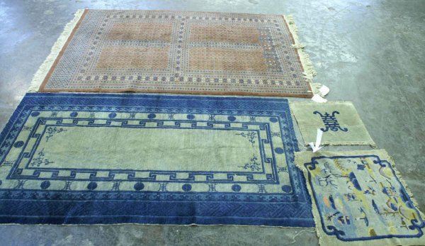FOUR SMALL AREA RUGS. 3 BLUE & WHITE, 1 RED RUG