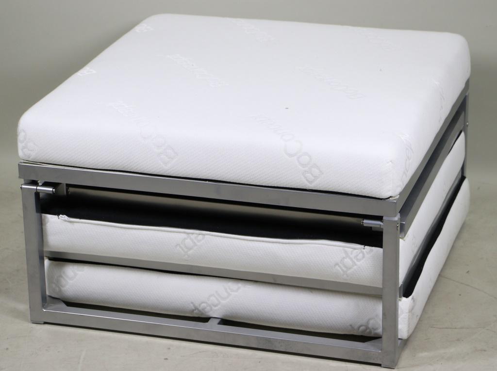 BOCONCEPT OTTOMAN/FUTON: BOCONCEPT OTTOMAN/FUTON CONVERTS TO TWIN SIZE BED. Height: 16 in. by Width: 28 in. by Depth: 28
