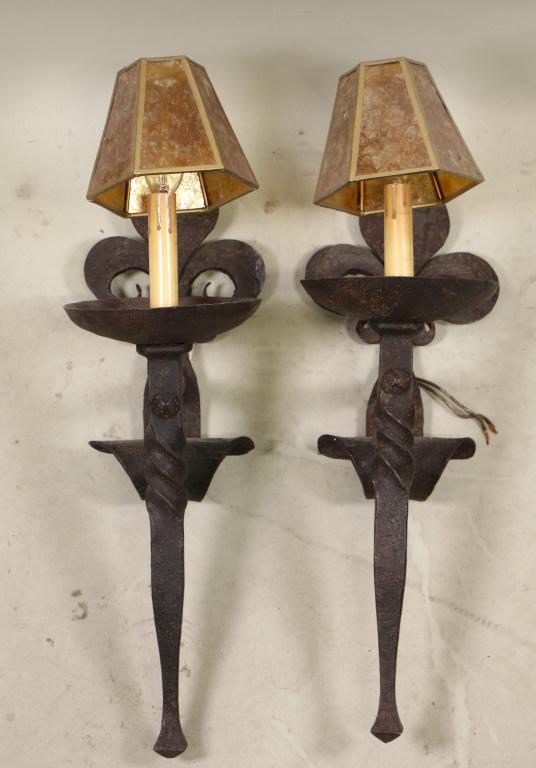 PAIR OF ANTIQUE WROUGHT IRON WALL SCONCES: PAIR OF ANTIQUE WROUGHT IRON WALL SCONCES Height: 22 in. by Width: 6 in. by Depth: 11 in.