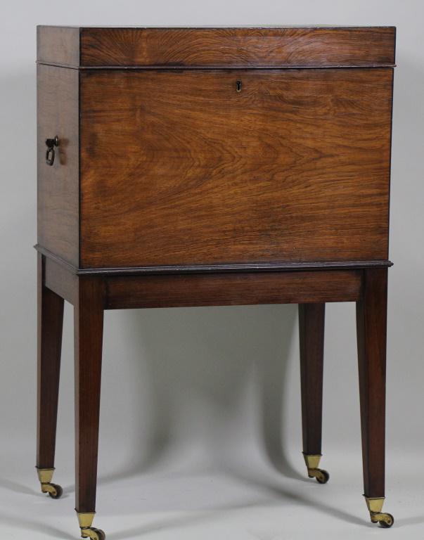 VINTAGE MAHOGANY WINE CELLARETTE: VINTAGE MAHOGANY WINE CELLARETTE ON CASTERS. Height: 29 in. by Width: 18 in. by Depth: 12 in.