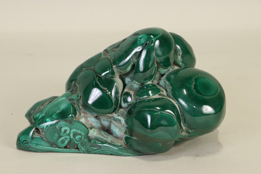 POLISHED MALACHITE SPECIMEN: POLISHED MALACHITE SPECIMEN. Height: 3 1/2 in. by Width: 6 in. by Depth: 5 in.