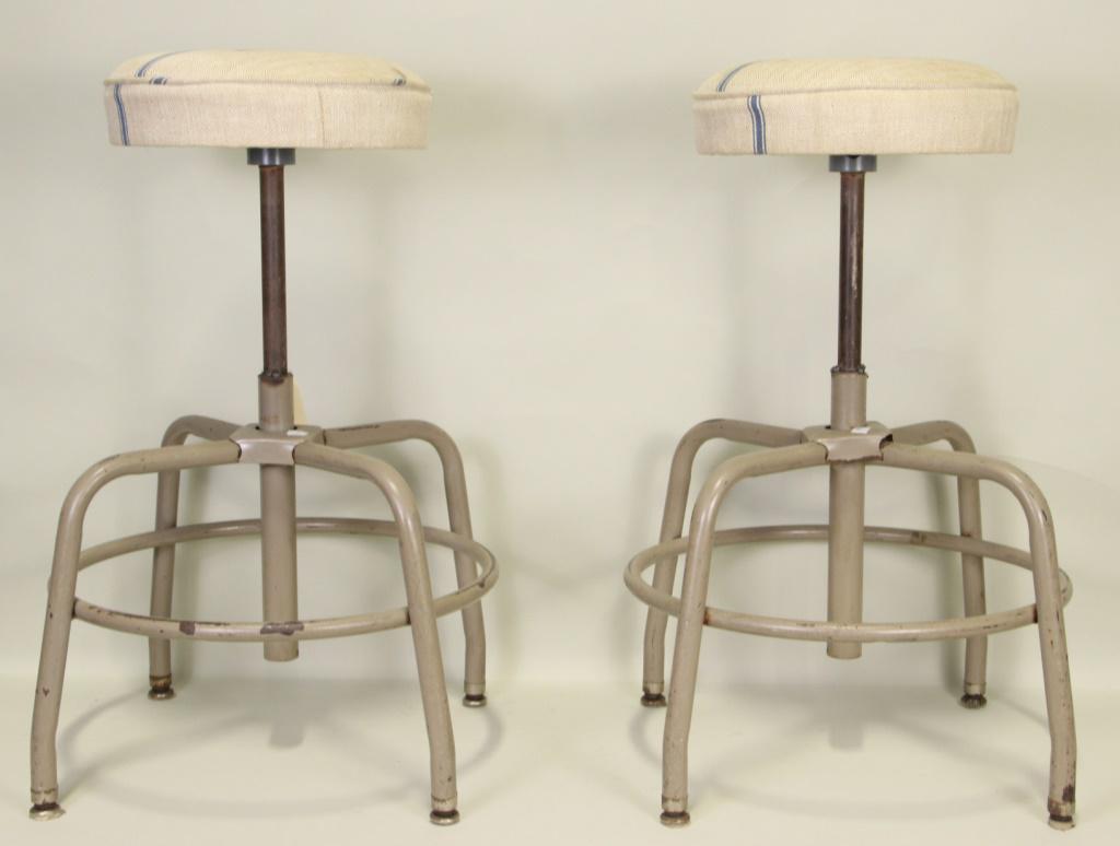 PAIR OF VINTAGE SWIVELING BAR STOOLS: PAIR OF VINTAGE SWIVELING BAR STOOLS. Height: 30 in. by Width: 20 in. by Depth: 20 in.
