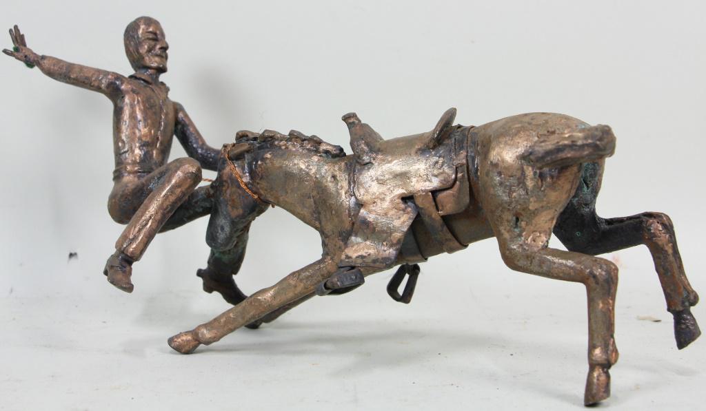 BRONZE BUCKING HORSE SCULPTURE: BRONZE BUCKING HORSE SCULPTURE Height: 6 1/2 in. by Width: 15 in. by Depth: 5 in.