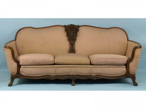 A VICTORIAN CARVED WOOD SOFA