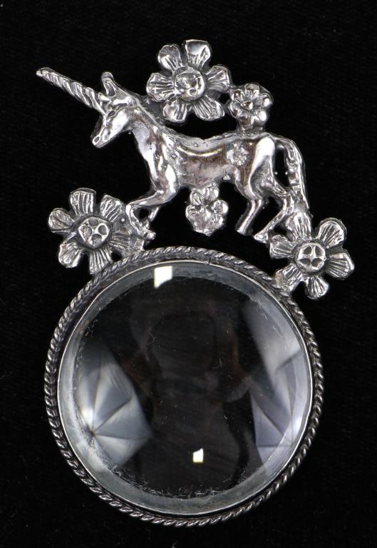SILVER UNICORN MAGNIFYING GLASS: SILVER UNICORN MAGNIFYING GLASS. Height: 3 in. by Width: 2 in. by Depth: 1/2 in.