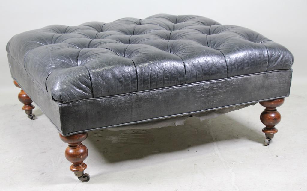 BUTTON TUFTED LEATHER OTTOMAN ON CASTERS (1 of 1)