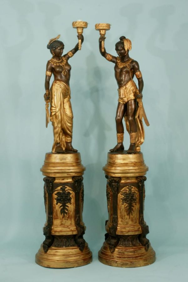 PAIR OF BRONZE MALE AND FEMALE LIGHT BEARER